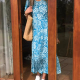 Robe longue à manches courtes imprimée de fleurs