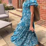 Robe longue à manches courtes imprimée de fleurs