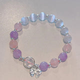 Bracelet imitation œil de chat cristal de papillon