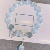 Bracelet imitation œil de chat cristal de papillon