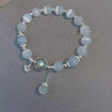Bracelet imitation œil de chat cristal de papillon
