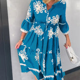 Robe à imprimé floral et manches 3/4