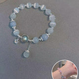 Bracelet imitation œil de chat cristal de papillon