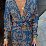 Robe élégante à manches longues et col en V imprimé vintage