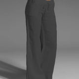 Pantalon uni jambes larges