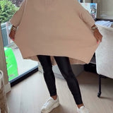Pull Avec Caractéristiques Col V, Boutonné Et Asymétrique