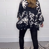 Blouse imprimée à manches cloche et boutons