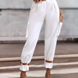 Pantalon cargo décontracté avec poche de couleur unie