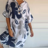Robe à poches à revers et imprimé floral