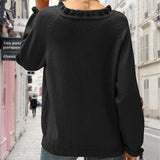 Pull décontracté de couleur unie avec bouton à revers et volants