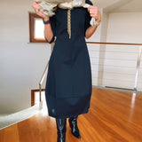 Robe élégante de couleur unie avec poche et col rond