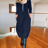 Robe élégante de couleur unie avec poche et col rond