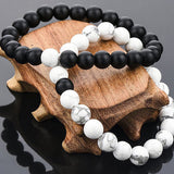 Ensemble de bracelets pour couple tissés en perles noires et blanches