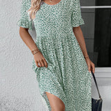 Robe élégante à col rond et imprimé floral