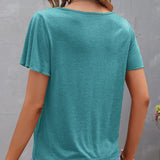 T-shirt à découpes de couleur unie