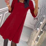 Robe unie avec nœud au dos