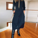 Robe élégante de couleur unie avec poche et col rond