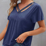 T-shirt à découpes de couleur unie