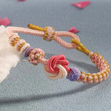 Bracelet avec noeud de fleurs de pêcher
