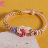 Bracelet avec noeud de fleurs de pêcher