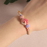 Bracelet avec noeud de fleurs de pêcher