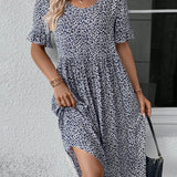 Robe élégante à col rond et imprimé floral