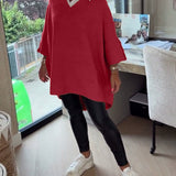 Pull Avec Caractéristiques Col V, Boutonné Et Asymétrique