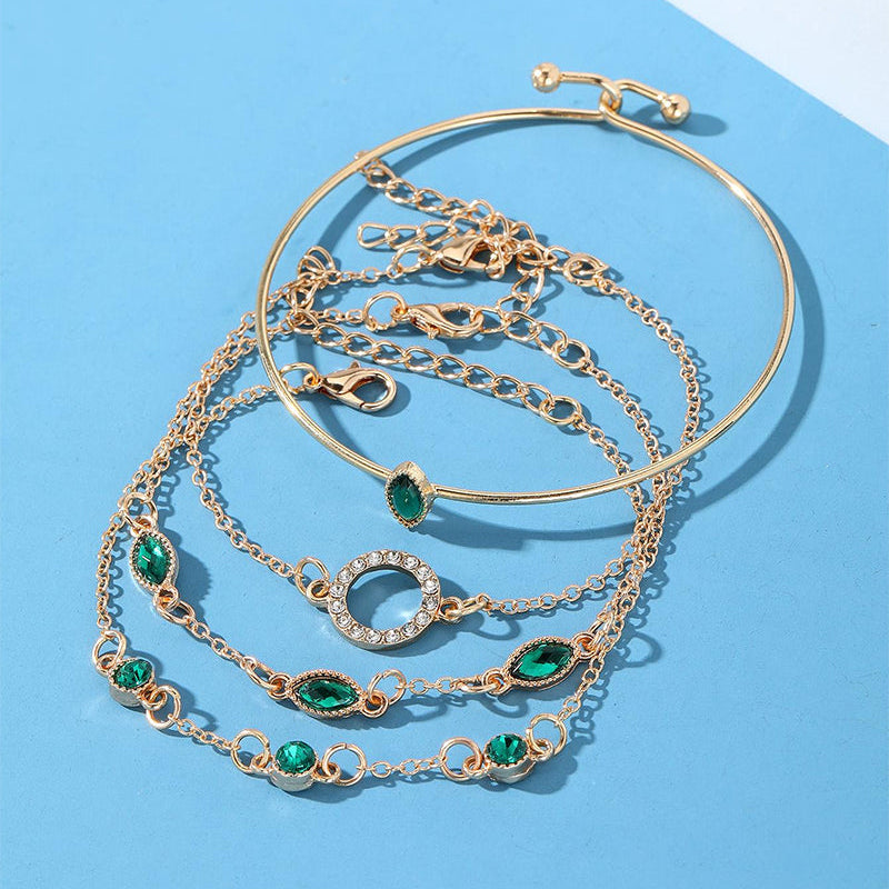 Ensemble de quatre bracelets en strass en forme de losange circulaire