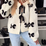 Cardigan à lacets avec perles et nœud