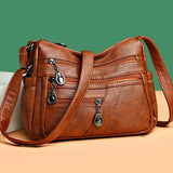 Sac bandoulière en cuir souple avec multipoches