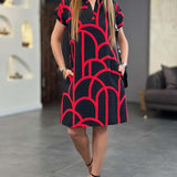 Robe midi imprimée à manches courtes et ligne de revers