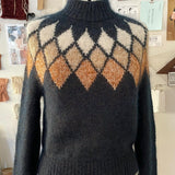 Pull à jacquard losange géométrique