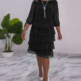 Robe élégante superposée à imprimé pois