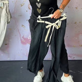 Pantalon décontracté confortable avec poche de couleur unie
