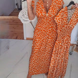 Robe élégante à imprimé léopard et col en V