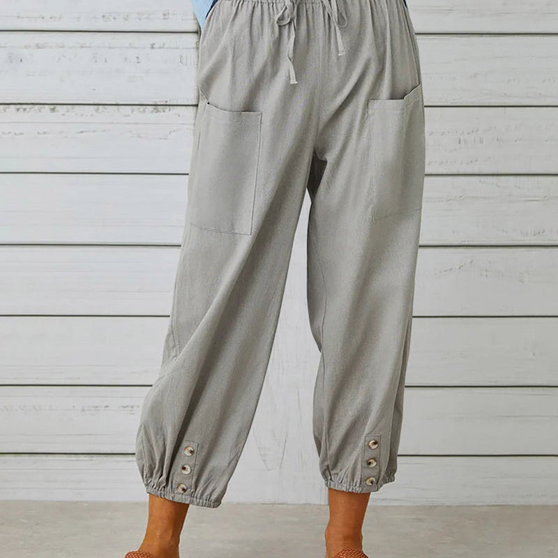 Pantalon taille haute bouton neuf points