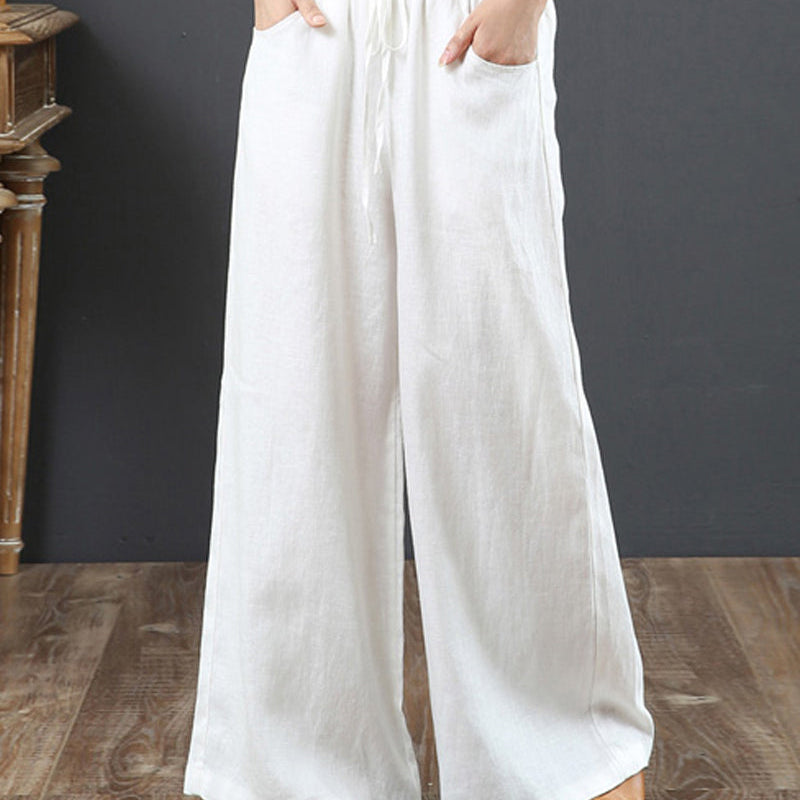 Pantalon large taille haute de couleur unie