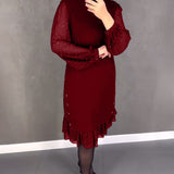 Robe élégante à pois et manches longues