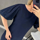 Robe élégante à manches courtes bouffantes