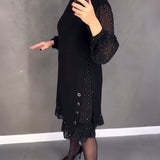 Robe élégante à pois et manches longues
