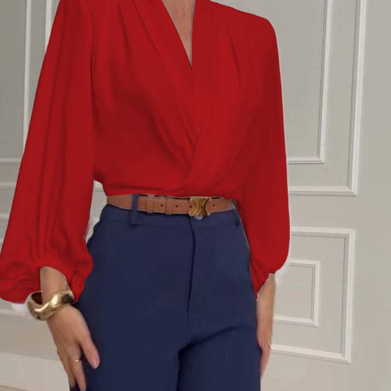 Chemisier tendance à manches lanternes et col en V de couleur unie