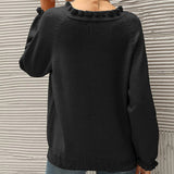 Pull décontracté de couleur unie avec bouton à revers et volants