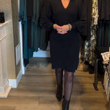 Robe pull de couleur unie à col en V