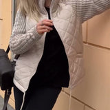 Manteau zippé à col haut de couleur unie