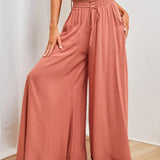 Pantalon taille haute de couleur unie
