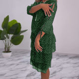 Robe élégante superposée à imprimé pois