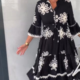 Robe à imprimé floral et manches 3/4