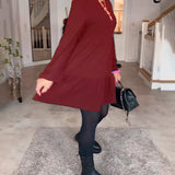 Robe simple à manches longues de couleur unie