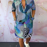 Robe à poches imprimée colorée avec col en V et demi-manches