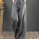 Pantalon large taille haute de couleur unie
